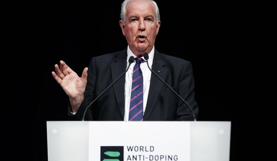 FILE - In this March 13, 2017, file photo, Craig Reedie, president of the world anti-doping agency (WADA), delivers his speech during the opening day of the 2017 WADA annual symposium in Lausanne, Switzerland. On Thursday, May 18, a bit over a year after The New York Times revealed the sordid specifics of a doping scandal that pervaded Russia’s Olympic team, the World Anti-Doping Agency’s governing board meets. (Valentin Flauraud/Keystone via AP, File)