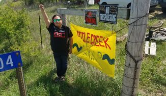 Vanessa Dundon, who goes by Sioux Z Dezbah, moved to the Little Creek Camp in Iowa after months of activism at the North Dakota pipeline protest. She was injured at the bridge standoff in November. (Valerie Richardson/The washington Times)