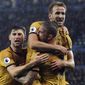 Tottenham&#x27;s Harry Kane, top, celebrates scoring his second goal during the English Premier League soccer match between Leicester City and Tottenham Hotspur at the King Power Stadium in Leicester, England, Thursday, May 18, 2017. (AP Photo/Rui Vieira)