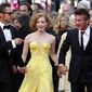 FILE - In this May 16, 2011 file photo, actors Brad Pitt,  from left, Jessica Chastain and Sean Penn arrive for the screening of their film, &amp;quot;The Tree of Life,&amp;quot; by filmmaker Terrence Malick, at the 64th international film festival, in Cannes, southern France. The film, which won the Palme d&#x27;Or award, was booed by critics at the film screening.  (AP Photo/Lionel Cironneau, File)