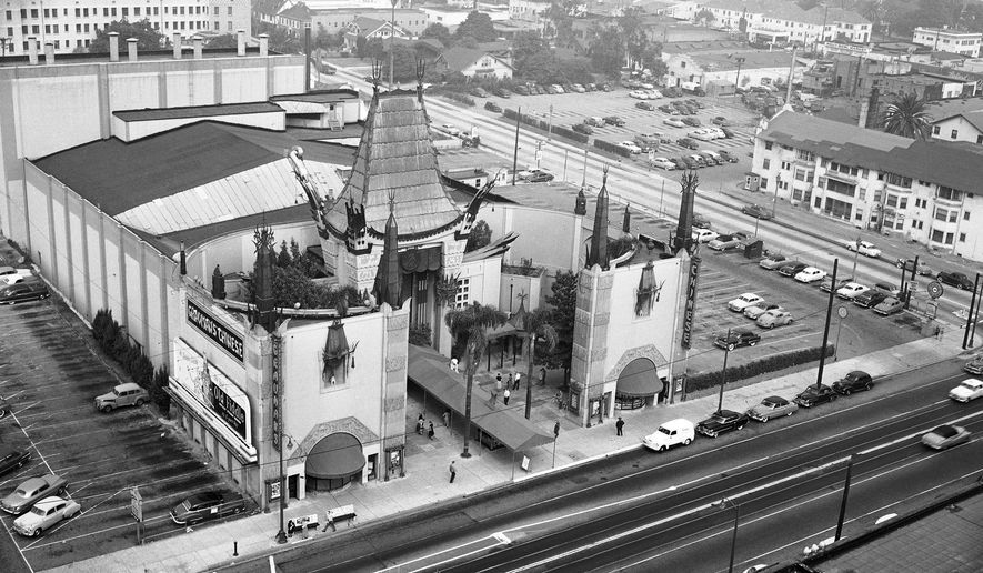 FILE - This 1952 file photo shows an aerial view of Grauman's Chinese Theater in the Hollywood section of Los Angeles. The storied Hollywood Boulevard movie palace now known as the TCL Chinese Theatre opened its doors on May 18, 1927. (AP Photo, File)