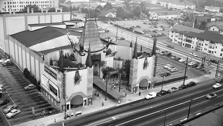 FILE - This 1952 file photo shows an aerial view of Grauman's Chinese Theater in the Hollywood section of Los Angeles. The storied Hollywood Boulevard movie palace now known as the TCL Chinese Theatre opened its doors on May 18, 1927. (AP Photo, File)