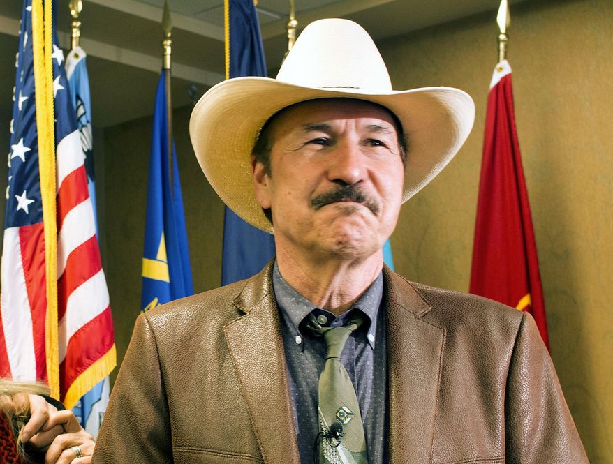 FILE - In this March 5, 2017 file photo, popular musician Rob Quist is shown at a news conference in Helena, Mont. In the weeks leading up to Montana's special congressional election, Democrat Quist and his surrogates fanned out across college campuses throughout the state, hoping to tap into a trove of progressive votes in a place where conservative values are as sturdy as the nearby Rocky Mountains. With just a week left to campaign before the May 25 election, Quist is counting on college-age voters to provide the sliver of ballots he needs to prevail in a nationally watched election for Montana's open congressional seat, vacant since Ryan Zinke resigned to become U.S. interior secretary. (AP Photo/Bobby Caina Calvan, File)