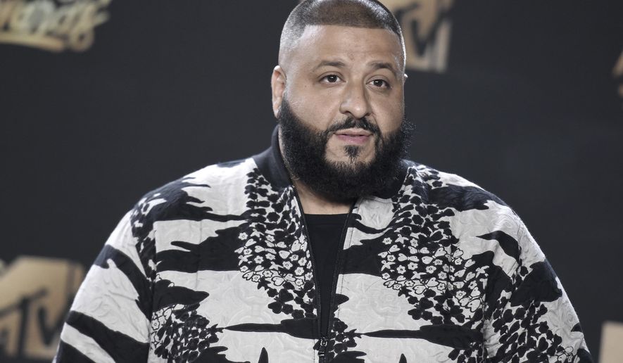 FILE - In this Sunday, May 7, 2017 file photo, DJ Khaled arrives at the MTV Movie and TV Awards at the Shrine Auditorium in Los Angeles. A group of future number-crunchers had their commencement crashed by DJ Khaled. The hip-hop star and social media celebrity gave a surprise performance at the ceremony Wednesday, May 17, 2017, for statistics graduates at the University of California, Berkeley. (Photo by Richard Shotwell/Invision/AP, File)