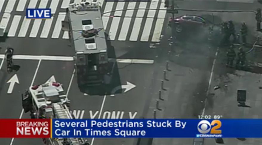 Several pedestrians were struck by a car in New York's Times Square Thursday. (CBS2)