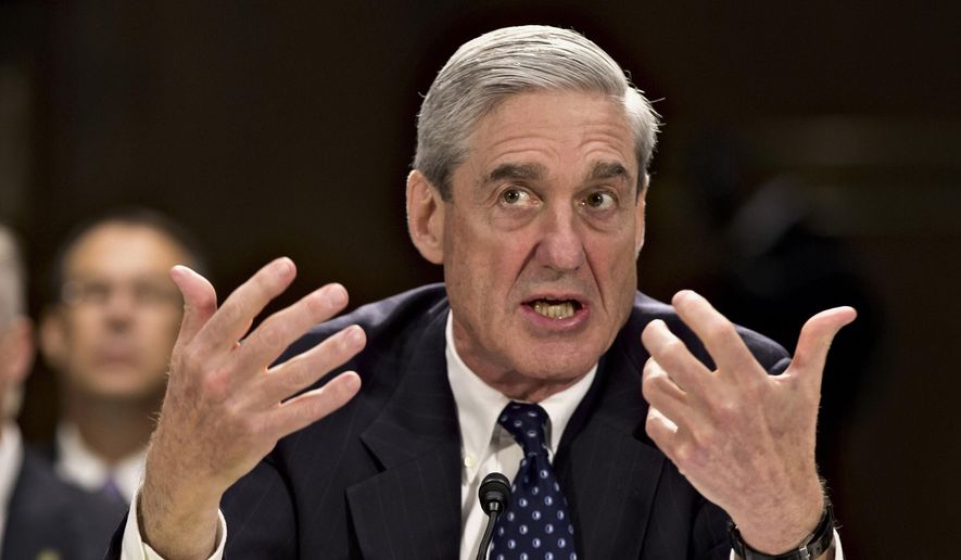 In this June 19, 2013, file photo, former FBI Director Robert Mueller testifies on Capitol Hill in Washington. Mueller was appointed in the spring of 2017 as special counsel to oversee investigation into Russian interference in the 2016 presidential election. (Associated Press) **FILE**