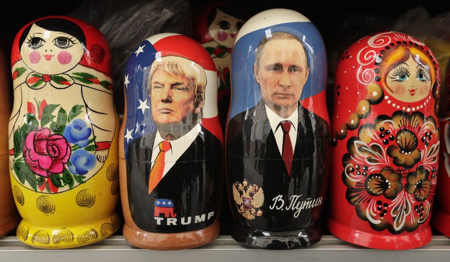 In this Monday, Feb. 20, 2017 photo, traditional Russian nesting dolls depicting US President Donald Trump, center left, and Russian President Vladimir Putin are displayed for sale at a souvenir street shop in St.Petersburg, Russia. While their country has become a daily source of headlines and political intrigue in the United States, most Russians are watching the drama over President Donald Trump&#x27;s relationship with Moscow with resignation, even indifference. Russian media, state-owned and private, chronicle Mr. Trump&#x27;s troubles matter-of-factly. Regular citizens generally care little about them. Many share the view that what&#x27;s unfolded in Washington has dimmed prospects for the mended Russia-U.S. ties his candidacy represented here and thus have lost interest. (AP Photo/Dmitri Lovetsky, file)
