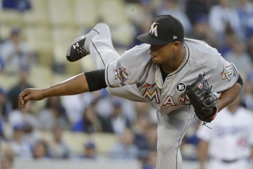Miami Marlins starting pitcher Edinson Volquez throws against the Los Angeles Dodgers during first inning of a baseball game in Los Angeles, Thursday, May 18, 2017. (AP Photo/Chris Carlson)