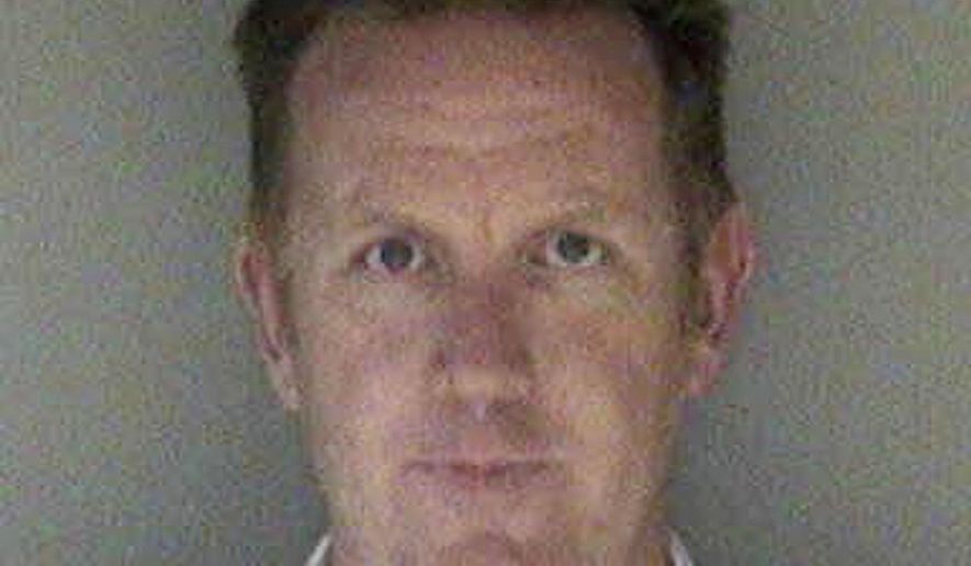 This undated photo released by the Alameda County Sheriff's Office shows Brian Bunton. A Northern California judge has ordered Bunton, a former Oakland police officer charged in a police-misconduct scandal, to stand trial, saying the officer behaved "like a pimp" in his dealings with a teen prostitute, Thursday, May 18, 2017. (Alameda County Sheriff's Office via AP)
