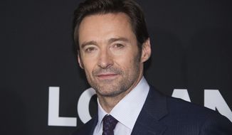 FILE - In this Feb. 24, 2017 file photo, Hugh Jackman attends a screening of &amp;quot;Logan&amp;quot; in New York. Jackman marked the character’s final performance in “Logan,” and is now promoting the film’s special noir treatment “Logan Noir,” with a black-and-white version of the film in theaters ahead of the DVD release. (Photo by Charles Sykes/Invision/AP, File)