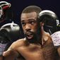Gary Russell Jr. prepares to throw a jab at Oscar Escandon during the WBC featherweight title fight in Oxon Hill, Md., Saturday, May 20, 2017. (AP Photo/Mark Tenally)