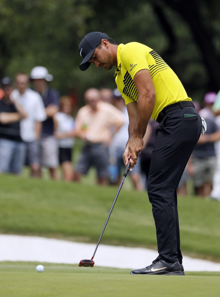 Jason Day, of Australia, putts on the 11th green during the third round of the Byron Nelson golf tournament, Saturday, May 20, 2017, in Irving, Texas. (AP Photo/Tony Gutierrez)