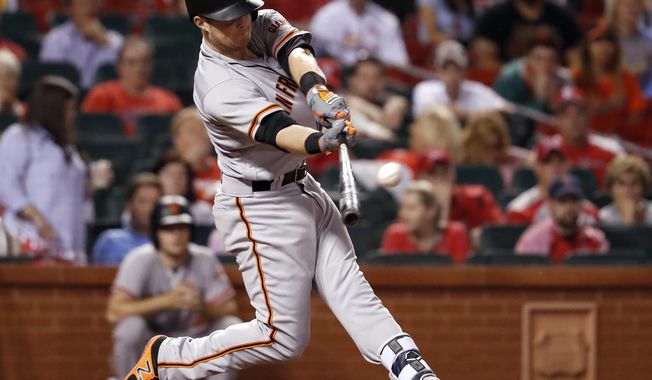 San Francisco Giants&#x27; Christian Arroyo hits a two-run double during the 13th inning of a baseball game against the St. Louis Cardinals, Saturday, May 20, 2017, in St. Louis. (AP Photo/Jeff Roberson)