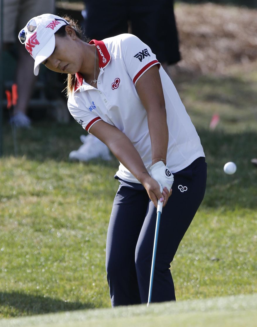 Lydia Ko, of New Zealand, chips up to the 10th green during the third round of the Kingsmill Championship LPGA golf tournament in Williamsburg, Va., Saturday, May 20, 2017. (AP Photo/Steve Helber)