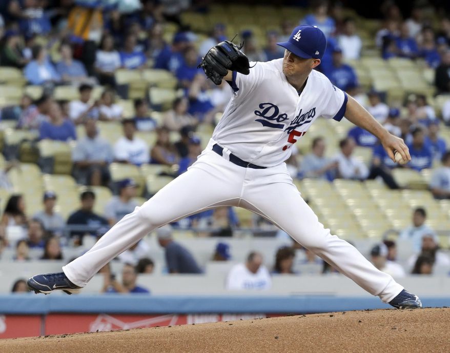 Los Angeles Dodgers starting pitcher Alex Wood throws against the Miami Marlins during the first inning of a baseball game in Los Angeles, Friday, May 19, 2017. (AP Photo/Chris Carlson)