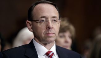  In this March 7, 2017, file photo, then-Deputy Attorney General-designate Rod Rosenstein, listens on Capitol Hill in Washington, during his confirmation hearing before the Senate Judiciary Committee. Rosenstein has told members of Congress he stands by a memo he wrote that preceded the president&#39;s firing of FBI Director James Comey. (AP Photo/J. Scott Applewhite, File)