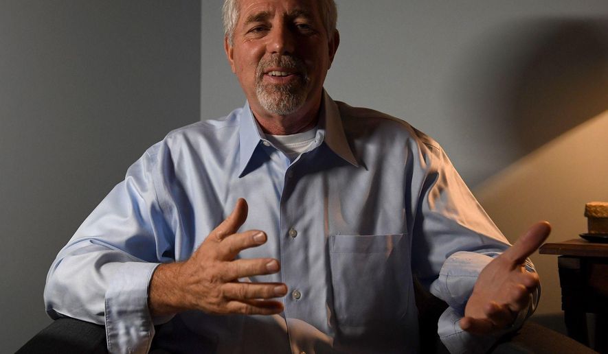 Trapper Sherwood gestures during a portrait session at 23 Sandstone Body and Mind Spa in Jackson, Tenn., on on Tuesday, May 16, 2017. The medical spa offers a wide variety of services that cater to relaxation and wellness of the body and mind, including hypnotherapy. (C.B. Schmelter/The Jackson Sun via AP)