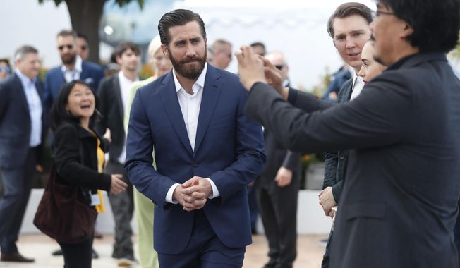Actor Jake Gyllenhaal arrives at the photo call for the film Okja at the 70th international film festival, Cannes, southern France, Friday, May 19, 2017. (AP Photo/Thibault Camus)