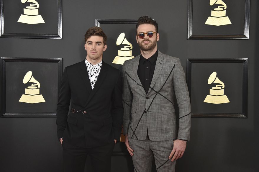 FILE - In this Feb. 12, 2017 file photo, Andrew Taggart, left, and Alex Pall of the musical group The Chainsmokers arrive at the 59th annual Grammy Awards at the Staples Center in Los Angeles. The Chainsmokers and Drake are on track to own the night at the 2017 Billboard Music Awards on Sunday, May 21 in Las Vegas. The electronic dance duo and the rapper are the top contenders at Sunday’s show with 22 nominations each. (Photo by Jordan Strauss/Invision/AP, File)