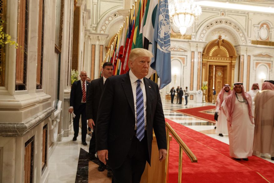 President Donald Trump arrives to deliver a speech to the Arab Islamic American Summit, at the King Abdulaziz Conference Center, Sunday, May 21, 2017, in Riyadh, Saudi Arabia. (AP Photo/Evan Vucci)