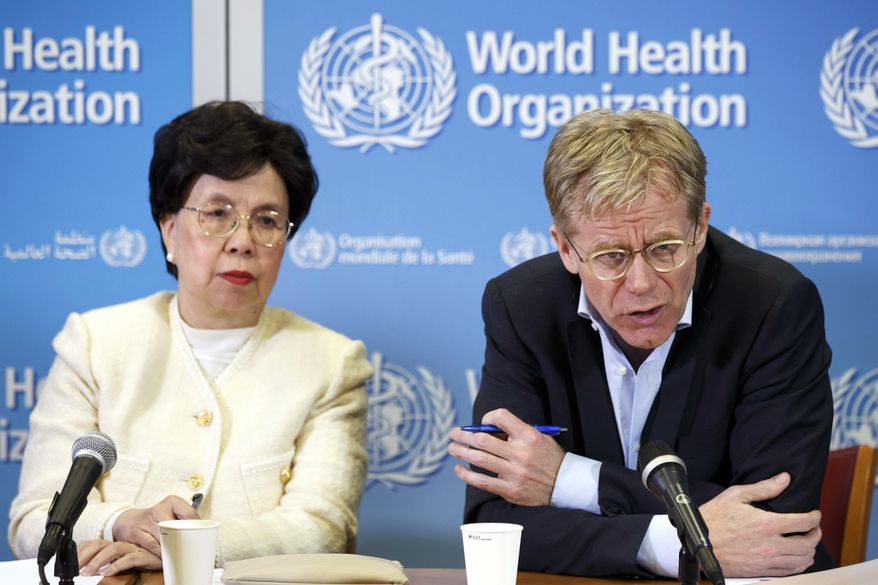 In this Tuesday, March 29, 2016, file photo, Margaret Chan, left, General Director of the World Health Organization (WHO), and Bruce Aylward, right, Executive Director of WHO and Health Emergencies Director-General&#39;s Special Representative for the Ebola Response, speak to the media after The International Health Regulations Emergency Committee on Ebola, during a press conference, at the WHO headquarters in Geneva, Switzerland. The World Health Organization routinely spends about $200 million a year on travel, far more than what it doles out to fight some of the biggest problems in public health including AIDS, tuberculosis and malaria, according to internal documents obtained by The Associated Press, published Sunday, May 21, 2017. (Salvatore Di Nolfi/Keystone via AP, File)