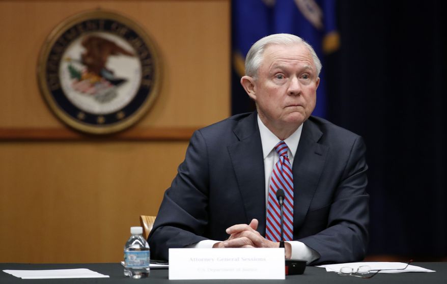 FILE - This April 18, 2017 file photo shows Attorney General Jeff Sessions at the Justice Department in Washington. Sessions said in a department memorandum on Monday, May 22, that the department may "tailor grants to promote a lawful system of immigration." That suggests officials could seek ways to withhold money from communities that refuse to honor detainer requests from federal immigration authorities. (AP Photo/Alex Brandon, File)