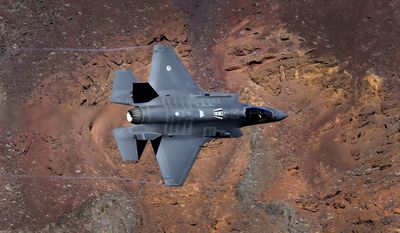 In this Feb. 28, 2017, file photo, a Lockheed Martin F-35A Lighting II from the 323 Squadron, Royal Netherlands Air Force flies through the nicknamed Star Wars Canyon on the Jedi transition in Death Valley National Park, Calif. (AP Photo/Ben Margot, File)