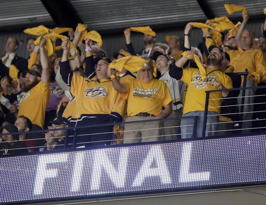 Nashville Predators fans cheer during the second period in Game 6 of the Western Conference final against the Anaheim Ducks in the NHL hockey Stanley Cup playoffs Monday, May 22, 2017, in Nashville, Tenn. (AP Photo/Mark Humphrey)