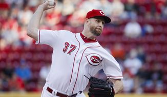 Cincinnati Reds starting pitcher Scott Feldman throws in the first inning of a baseball game against the Cleveland Indians, Monday, May 22, 2017, in Cincinnati. (AP Photo/John Minchillo)