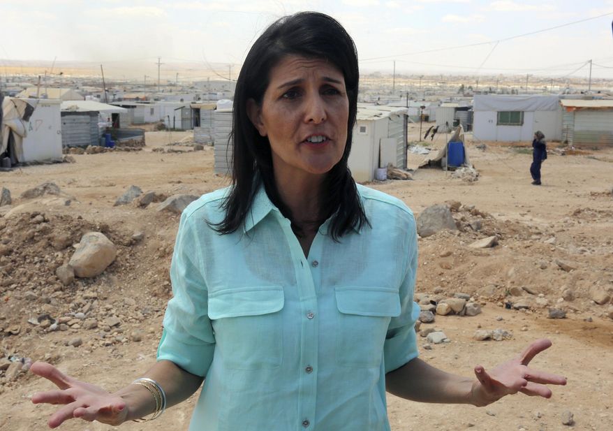U.S. Ambassador to the United Nations Nikki Haley speaks to journalist during a visit to the Zaatari Refugee Camp, Jordan, Sunday, May 21, 2017. (AP Photo/Raad Adayleh, Pool)