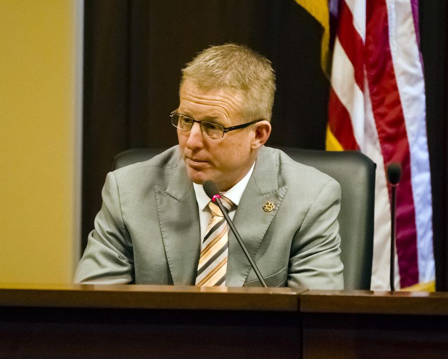 FILE--In this Jan. 6, 2017, file photo, Idaho House Minority Leader Mat Erpelding, D-Boise, speaks to reporters about the upcoming 2017 legislative session at the State Capitol in Boise, Idaho. Like many states, Idaho doesn't have resign-to-run laws preventing office holders from dedicating time and resources to campaign for another position. Erpelding and other Idaho state officials are asking U.S. Rep. Raul Labrador to leave Congress while he campaigns for the Idaho governor's seat. (AP Photo/Otto Kitsinger, file)