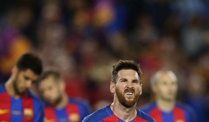FC Barcelona's Lionel Messi reacts at the end of the Spanish La Liga soccer match between FC Barcelona and Eibar at the Camp Nou stadium in Barcelona, Spain, Sunday, May 21, 2017. (AP Photo/Manu Fernandez)