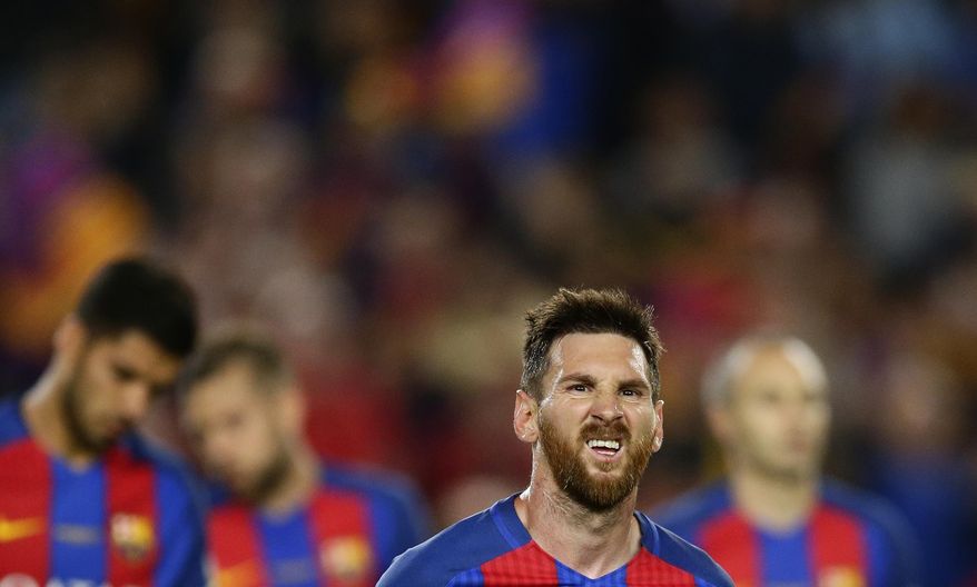 FC Barcelona's Lionel Messi reacts at the end of the Spanish La Liga soccer match between FC Barcelona and Eibar at the Camp Nou stadium in Barcelona, Spain, Sunday, May 21, 2017. (AP Photo/Manu Fernandez)