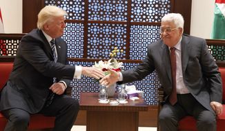 U.S. President Donald Trump, left,  meets with Palestinian President Mahmoud Abbas, Tuesday, May 23, 2017, in the West Bank City of Bethlehem. (AP Photo/Evan Vucci)