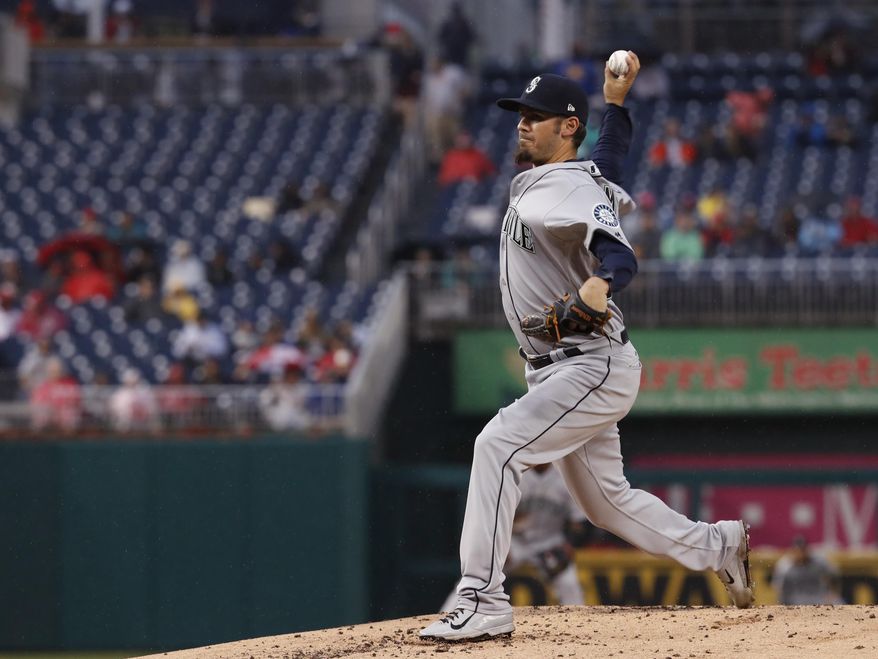 Seattle Mariners starting pitcher Christian Bergman (56) throws a pitch during the first inning of a baseball game against the Washington Nationals in Washington, Tuesday, May 23, 2017. (AP Photo/Manuel Balce Ceneta)