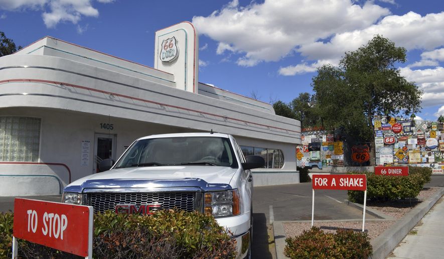 In this May 19, 2017 photo, the Route 66 Diner, once a gas station is shown in Albuquerque, N.M. Route 66, the American Mother Road that once connected motorists from Illinois to California, may lose its place in a National Park Service's preservation program, ending years of efforts aimed at reviving old tourist spots in struggling towns. A federal law authorizing the Route 66 Corridor Preservation Program is set to expire in two years. (AP Photo/Russell Contreras)