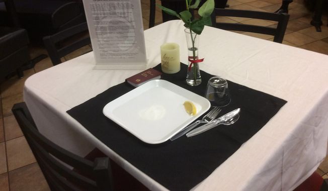 Select D.C.-area Chick-fil-A restaurants set up Missing Man Tables, like this one at the Bristow Chick-fil-A in Manassas, Virginia, for its market-wide Military Appreciation Day on Wednesday, May 25, to honor those who have made the ultimate sacrifice. Image courtesy of Chick-fil-A.