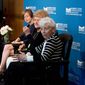 Jenny Connell Robertson (far right) whose Navy pilot husband died in captivity, and Helene Knapp (second from right), whose Air Force pilot husband is still missing in action, spoke at a May 7 event to open the exhibit, &quot;The League of Wives: Vietnam&#39;s POW/MIA Allies and Advocates,&quot; at the Robert J. Dole Institute of Politics in Lawrence, Kansas. Heath Hardage Lee (center), curator of the exhibit, and Audrey Coleman (left), assistant director and senior archivist at the Dole Institute, joined the panel. Image courtesy of Robert J. Dole Institute of Politics.