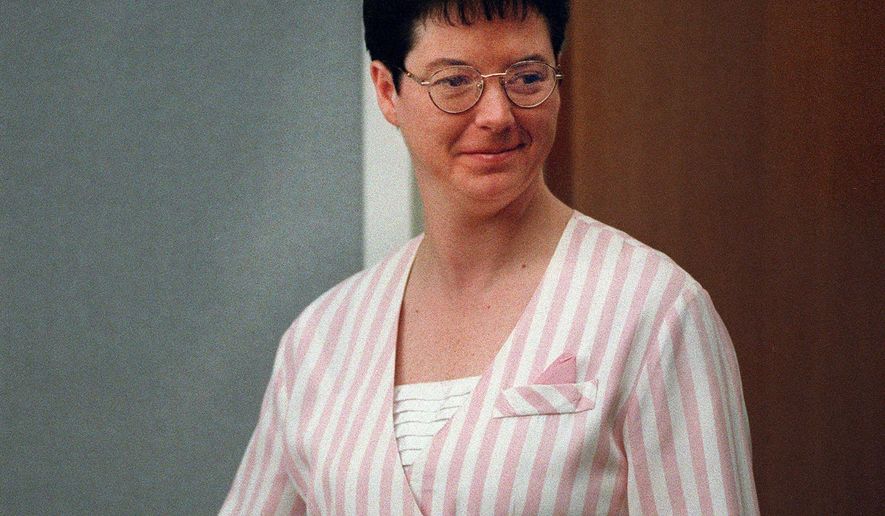 FILE- This Nov. 13, 1998 file photo, Kelly Gissendaner enters the courtroom at the Gwinnett Justice & Administration Center in Lawrenceville, Ga. Gissendaner, the only woman on Georgia's death row when she was executed in September 2015, sobbed through apologies to the family of her husband, Douglas Gissendaner, whom she had conspired to have her lover kill. In Georgia, condemned inmates are given two minutes to make a last statement. ( Louie Favorite /Atlanta Journal-Constitution via AP, File)