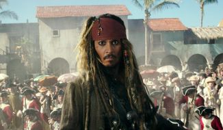 In this image released by Disney, Johnny Depp portrays Jack Sparrow in a scene from &amp;quot;Pirates of the Caribbean: Dead Men Tell No Tales.&amp;quot; (Disney via AP)