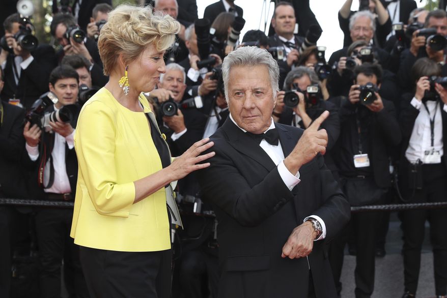 Actors Emma Thompson, left, and Dustin Hoffman pose for photographers upon arrival at the screening of the film The Meyerowitz Stories at the 70th international film festival, Cannes, southern France, Sunday, May 21, 2017. (AP Photo/Alastair Grant)