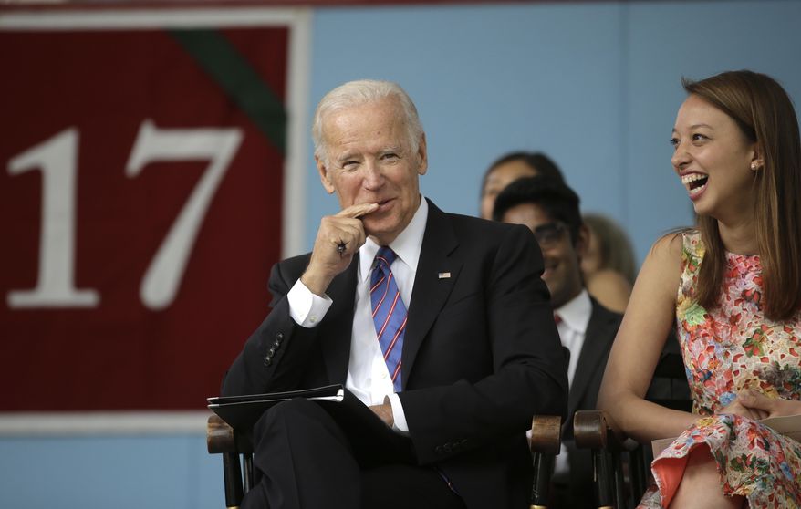 Former Vice President Joe Biden listens while seated on the stage during 2017 Harvard College Class Day exercises, Wednesday, May 24, 2017, at Harvard University, in Cambridge, Mass. Biden delivered the 2017 Class Day address. (AP Photo/Steven Senne)