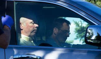 Republican candidate for Montana&#x27;s only U.S. House seat, Greg Gianforte, sits in a vehicle near a Discovery Drive building Wednesday, May 24, 2017, in Bozeman, Mont. A reporter said Gianforte &amp;quot;body-slammed&amp;quot; him Wednesday, the day before the special election. (Freddy Monares/Bozeman Daily Chronicle via AP)