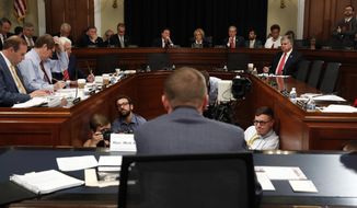 House Budget Committee Chair Rep. Diane Black, R-Tenn., back center right, questions Budget Director Mick Mulvaney on Capitol Hill in Washington, Wednesday, May 24, 2017, during the committee&#39;s hearing on President Donald Trump&#39;s fiscal 2018 federal budget. (AP Photo/Jacquelyn Martin)