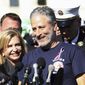 FILE - In this Sept. 16, 2015 file photo,  Jon Stewart, accompanied by Rep. Carolyn Maloney, D-N,Y., and New York City first responders speaks during a rally on Capitol Hill in Washington.  HBO says it&#x27;s scrapping a Web-delivered venture it was developing with Stewart. In a statement Wednesday, May 24, 2017,  the network said the short-form digital animated project had proved too technically difficult for a quick turnaround. The animated series would have allowed Stewart to comment on daily breaking news in real time. (AP Photo/Lauren Victoria Burke)