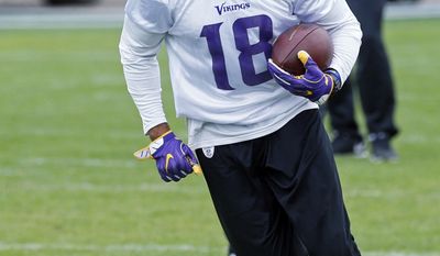 Minnesota Vikings wide receiver Michael Floyd runs with a pass during NFL football practice, Wednesday, May 24, 2017, in Eden Prairie, Minn. Back in his native state, with family, friends and former Notre Dame teammates now around him, Floyd is in position to get his career and life back on track following a drunken driving sentence. (AP Photo/Jim Mone)