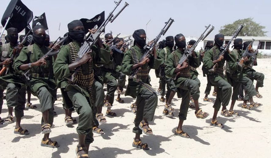 Hundreds of newly trained al-Shabab fighters performed military exercises, in Feb. 2011, in the Lafofe area some 11 miles south of Mogadishu, in Somalia. The U.S. military said today that a service member was killed in Somalia during an operation against the extremist group al-Shabab. (Associated Press)