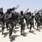 Hundreds of newly trained al-Shabab fighters performed military exercises, in Feb. 2011, in the Lafofe area some 11 miles south of Mogadishu, in Somalia. The U.S. military said today that a service member was killed in Somalia during an operation against the extremist group al-Shabab. (Associated Press)