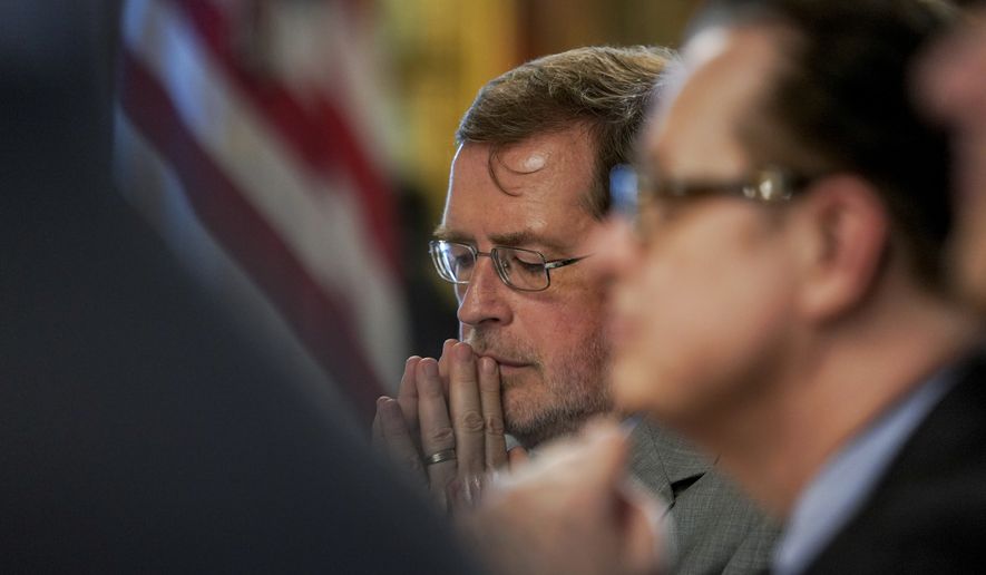 Grover Norquist of Americans for Tax Reform, center, attends a meeting held by Budget Director Mick Mulvaney in the Eisenhower Executive Office Building on the White House complex in Washington, Thursday, May 25, 2017. (AP Photo/Andrew Harnik)