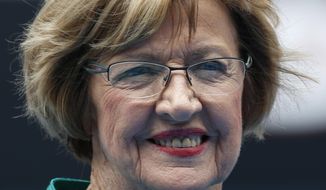In this Jan. 26, 2015 photo, Australian tennis great Margaret Court smiles during the official launch of the remodeled Margaret Court Arena at the Australian Open tennis championship in Melbourne. Former tennis great and now Christian pastor Court says she will stop using Qantas “where possible” in protest over the Australian airline&#39;s promotion of same-sex marriage. “I am disappointed that Qantas has become an active promoter for same-sex marriage,&amp;quot; Perth resident Court said in the letter published Thursday, May 25, 2017, in The West Australian newspaper. (AP Photo/Vincent Thian)